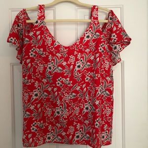 Red top with black floral print